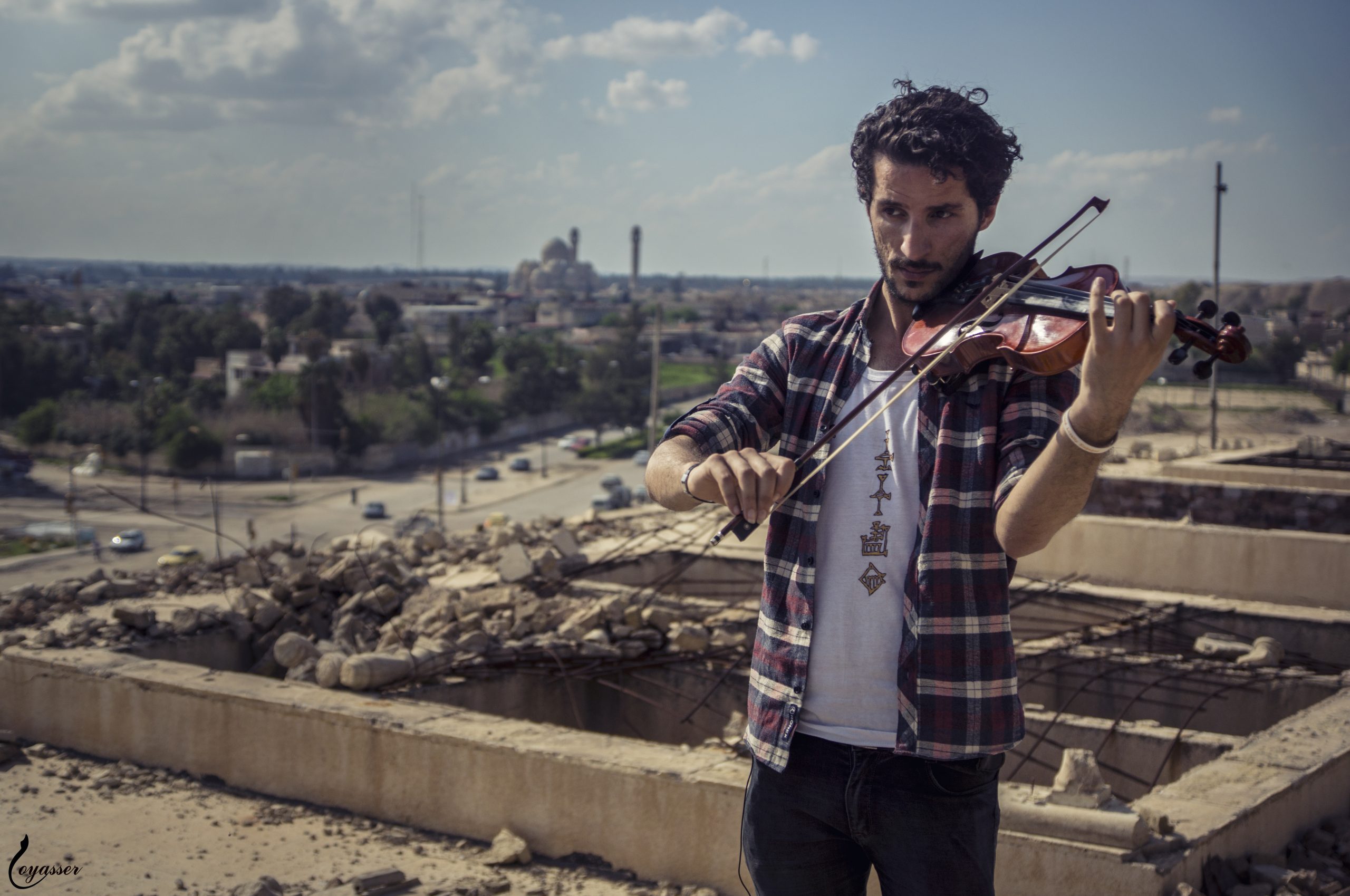 Ameen Mokdad playing violin